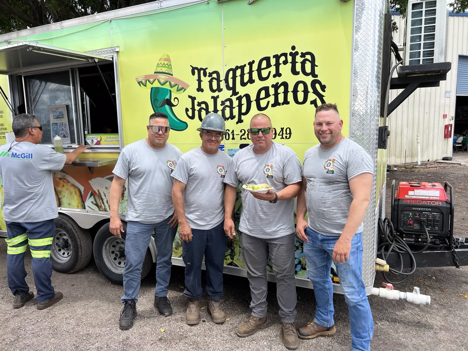 McGill team enjoying lunch together at a Taqueria Jalapenos food truck